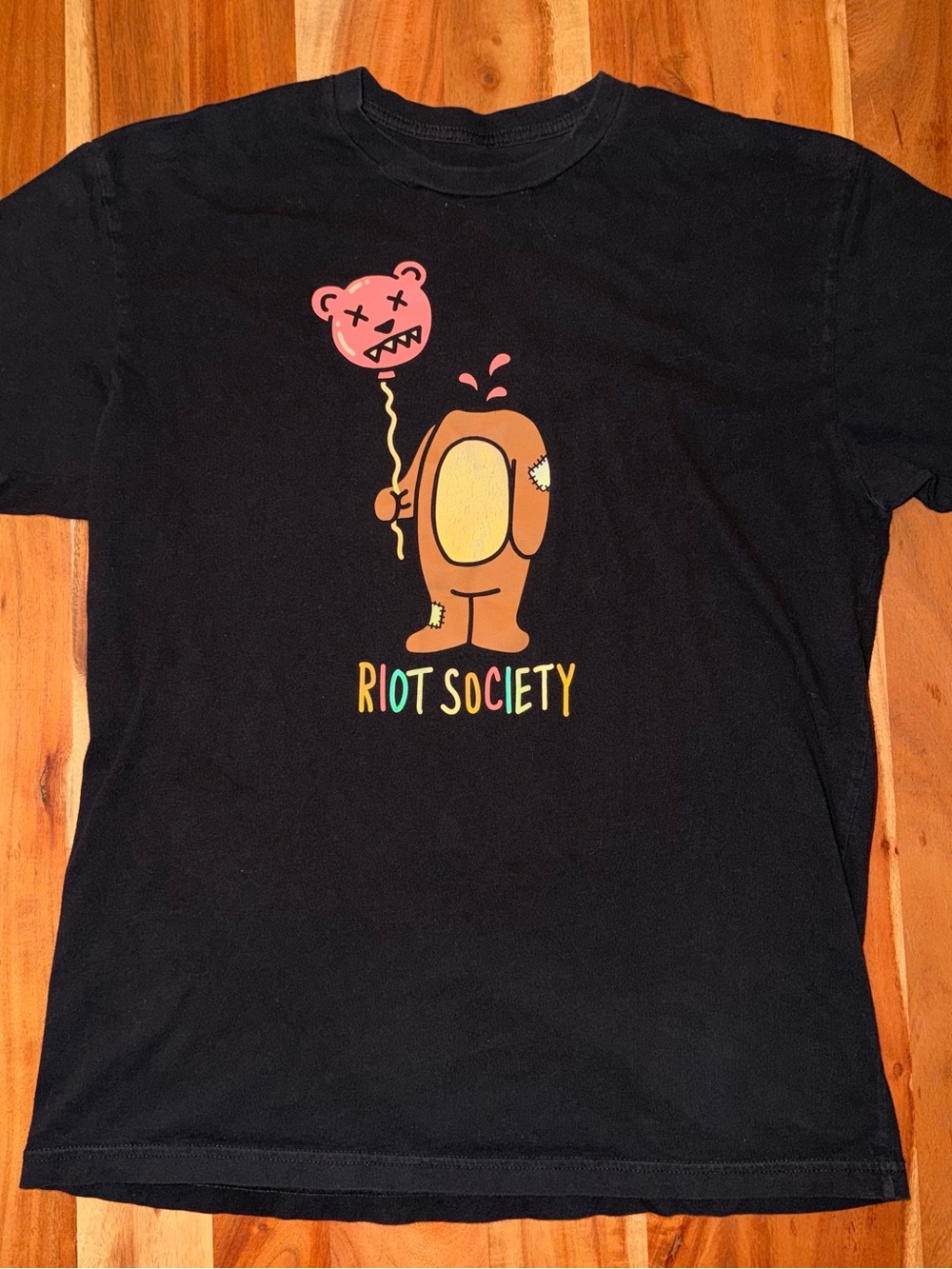 Riot Society Black Graphic Tee with Orange Character #006